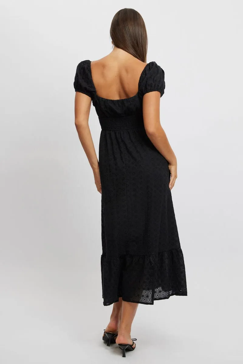 The dress??s versatile design allows you to wear it for work, weekend outings, or evening events Black Maxi Dress Puff Sleeve Eyelet Fabric
