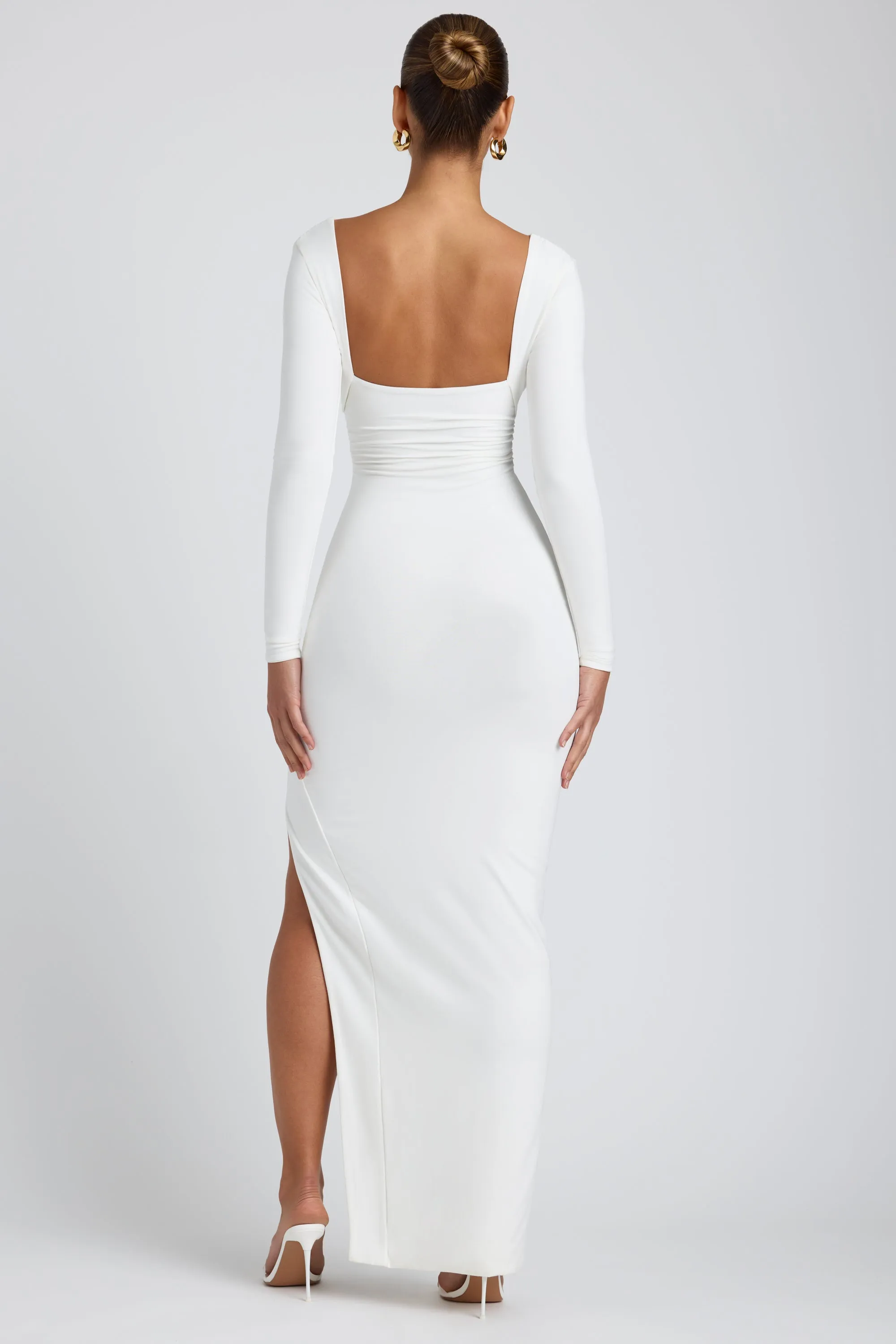 Modal Plunge Neck Long Sleeve Maxi Dress in White This dress provides the perfect blend of comfort and sophistication for any occasion With its simple silhouette this maxi dress offers a flattering look for all body types