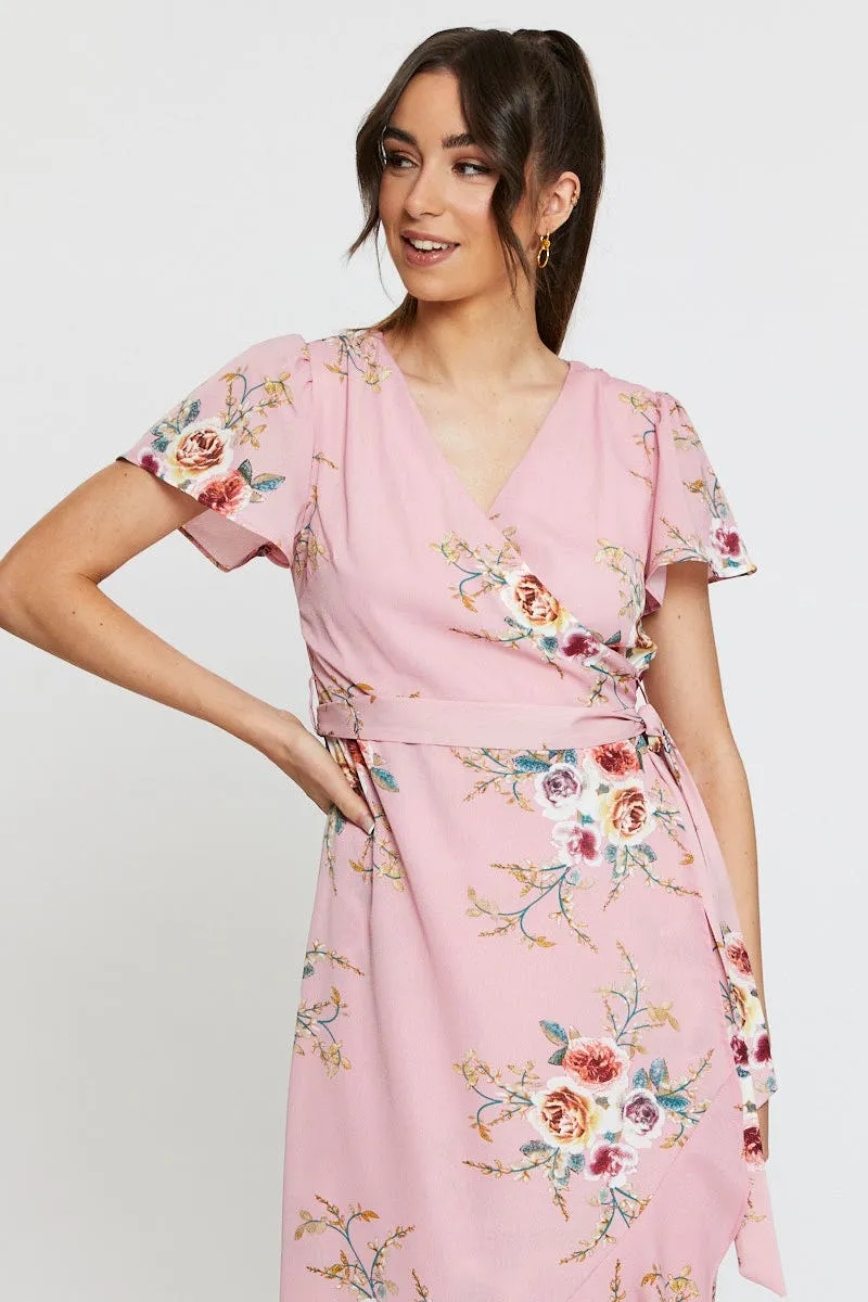 With its soft fabric and elegant cut this dress is perfect for all-day wear Global Soul Print Wrap Dress Midi