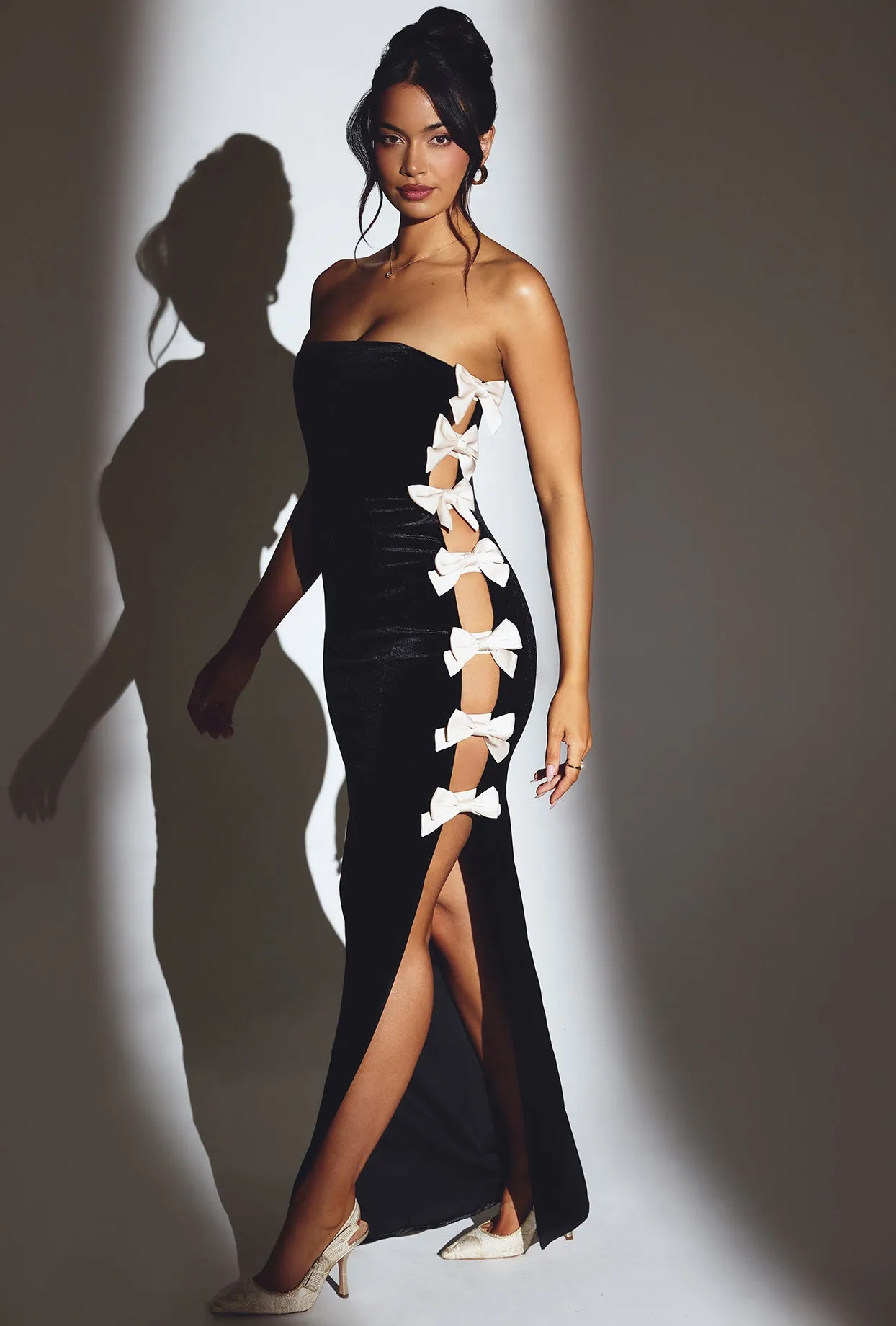 Velvet Bow Detail Maxi Dress in Jet Black The sleek lines of this maxi dress create a flattering and elegant look for any event Forest Path