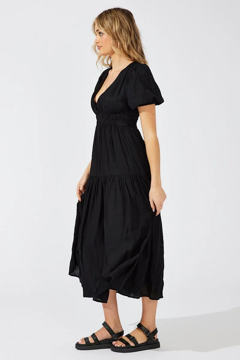 Black Maxi Dress Puff Sleeve This dress works effortlessly for a variety of events providing both comfort and style Rural Air