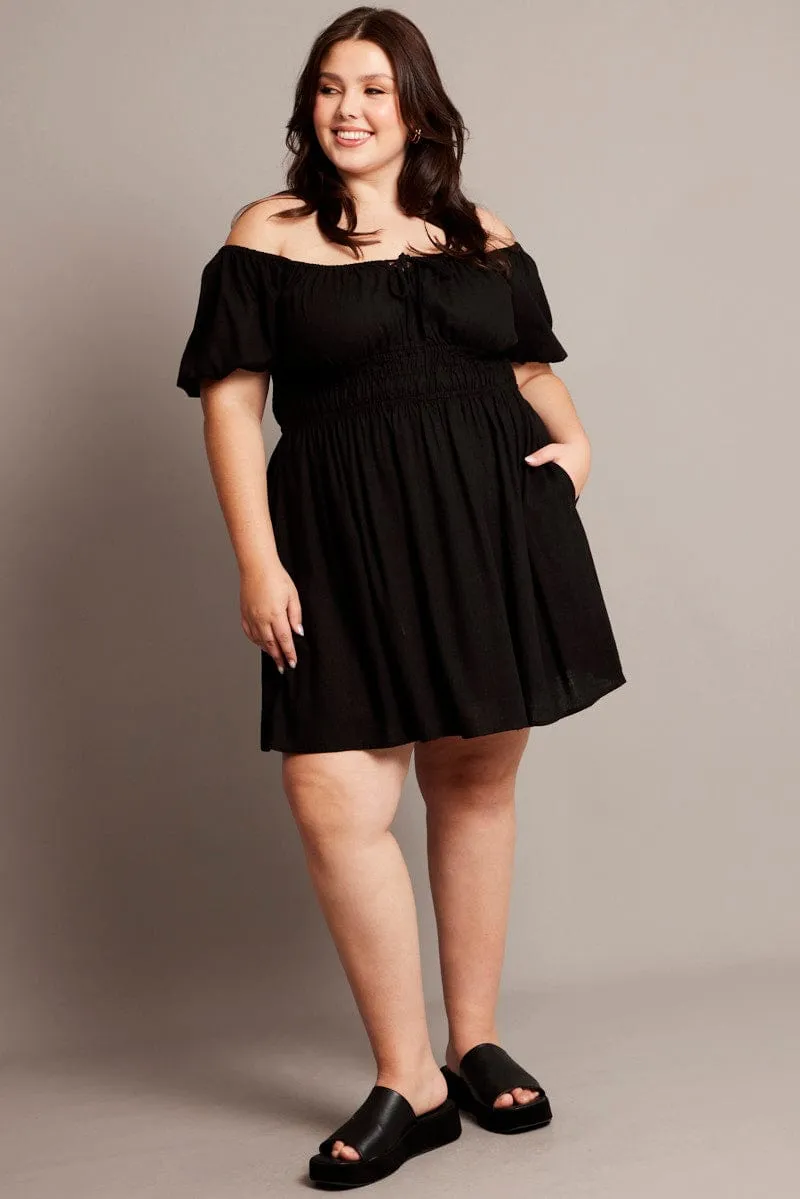 Sleek fit-and-flare style Street Spice Black Tie Front Scoop Neck Mini Dress