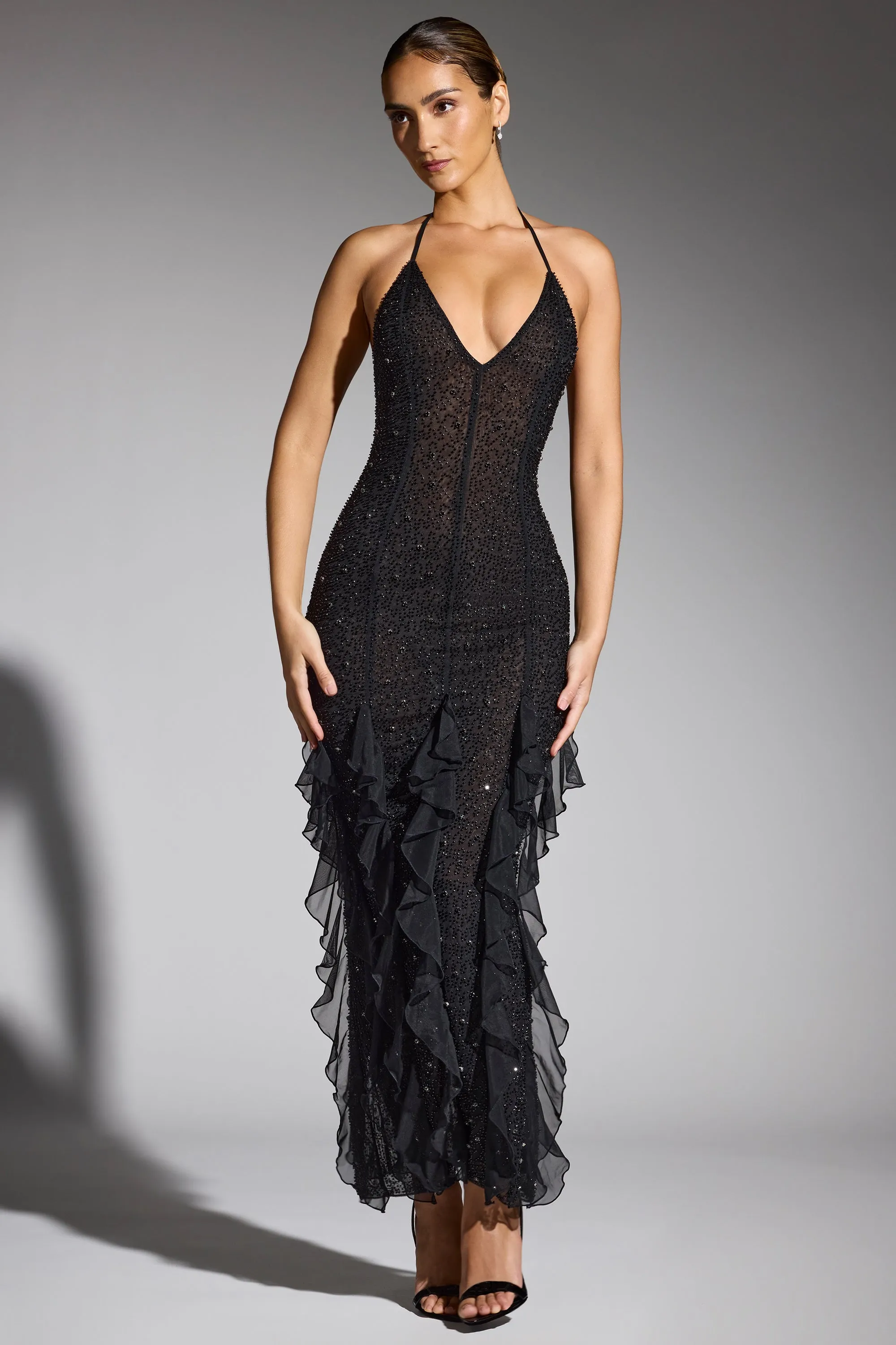 Embellished Halter Neck Ruffle Maxi Dress in Black Perfect for layering with jackets or sweaters this maxi dress works for year-round wear