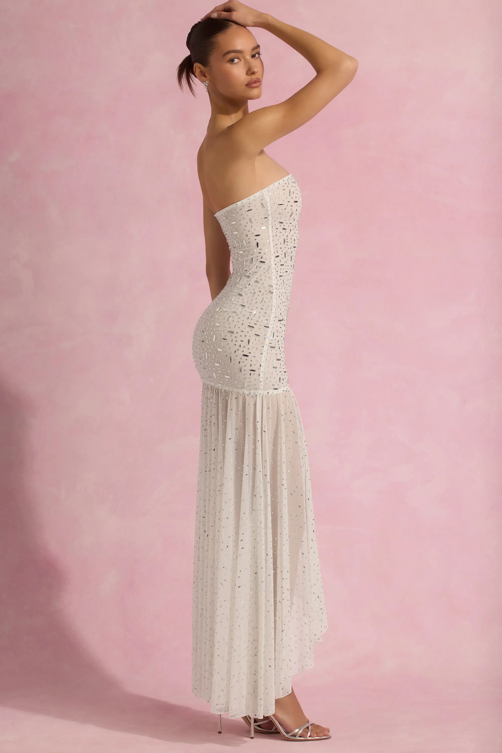 This maxi dress offers the perfect combination of comfort and elegance for everyday wear Fantasy Touch Semi-Sheer Embellished Asymmetric Maxi Dress in White