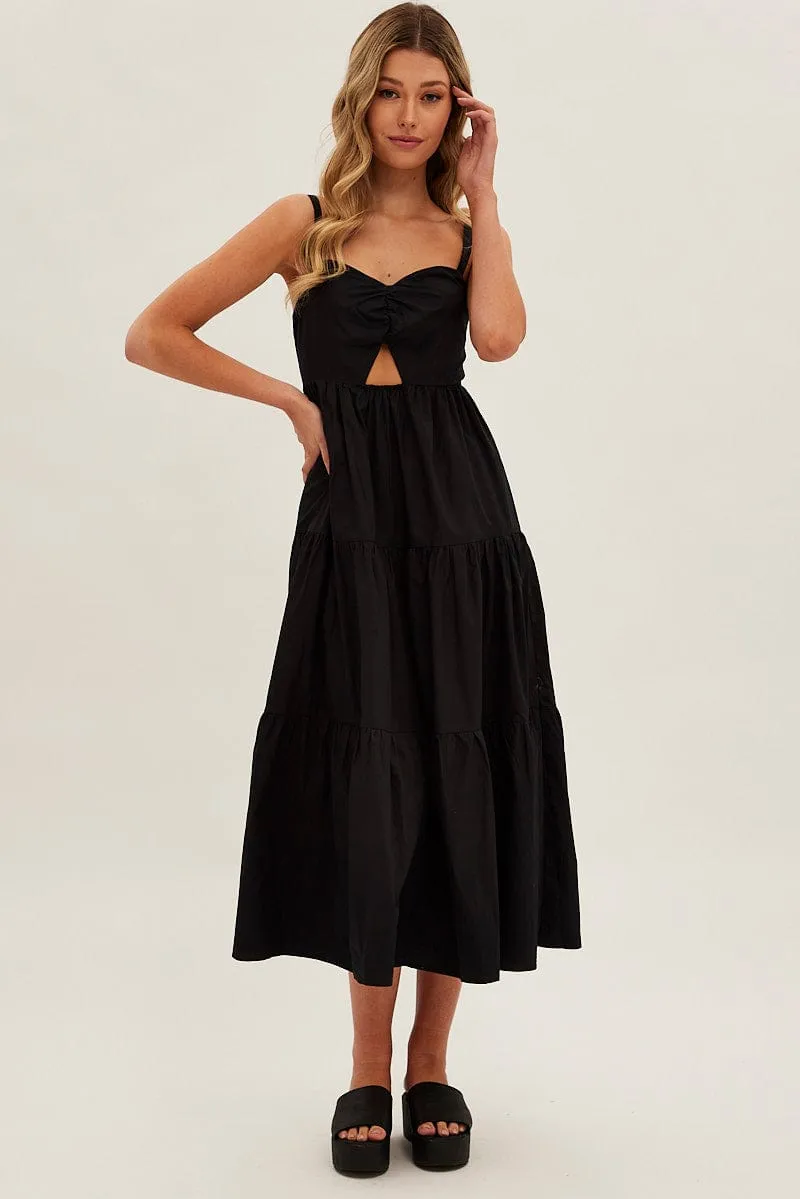 This maxi dress is designed to be worn season after season due to its timeless appeal Black Maxi Dress Sleeveless Ruched Front