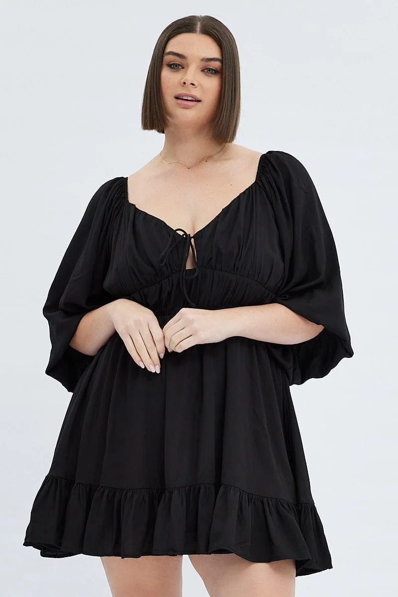 Black Fit And Flare Dress 3/4 Sleeve Tiered Cut Out Flattering Shape Relaxed fit knee-length piece
