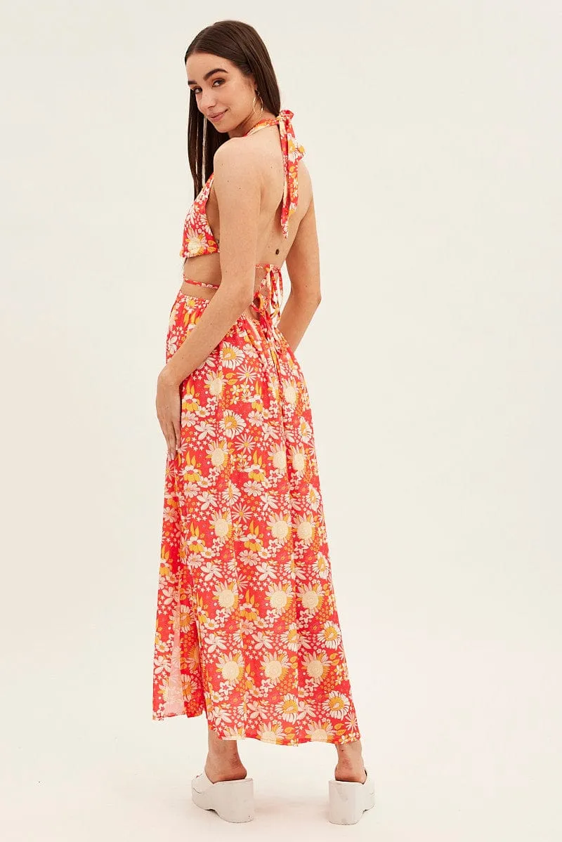 Designed with simplicity and sophistication in mind this dress is perfect for any occasion Red Floral Maxi Dress Cutout Front Split