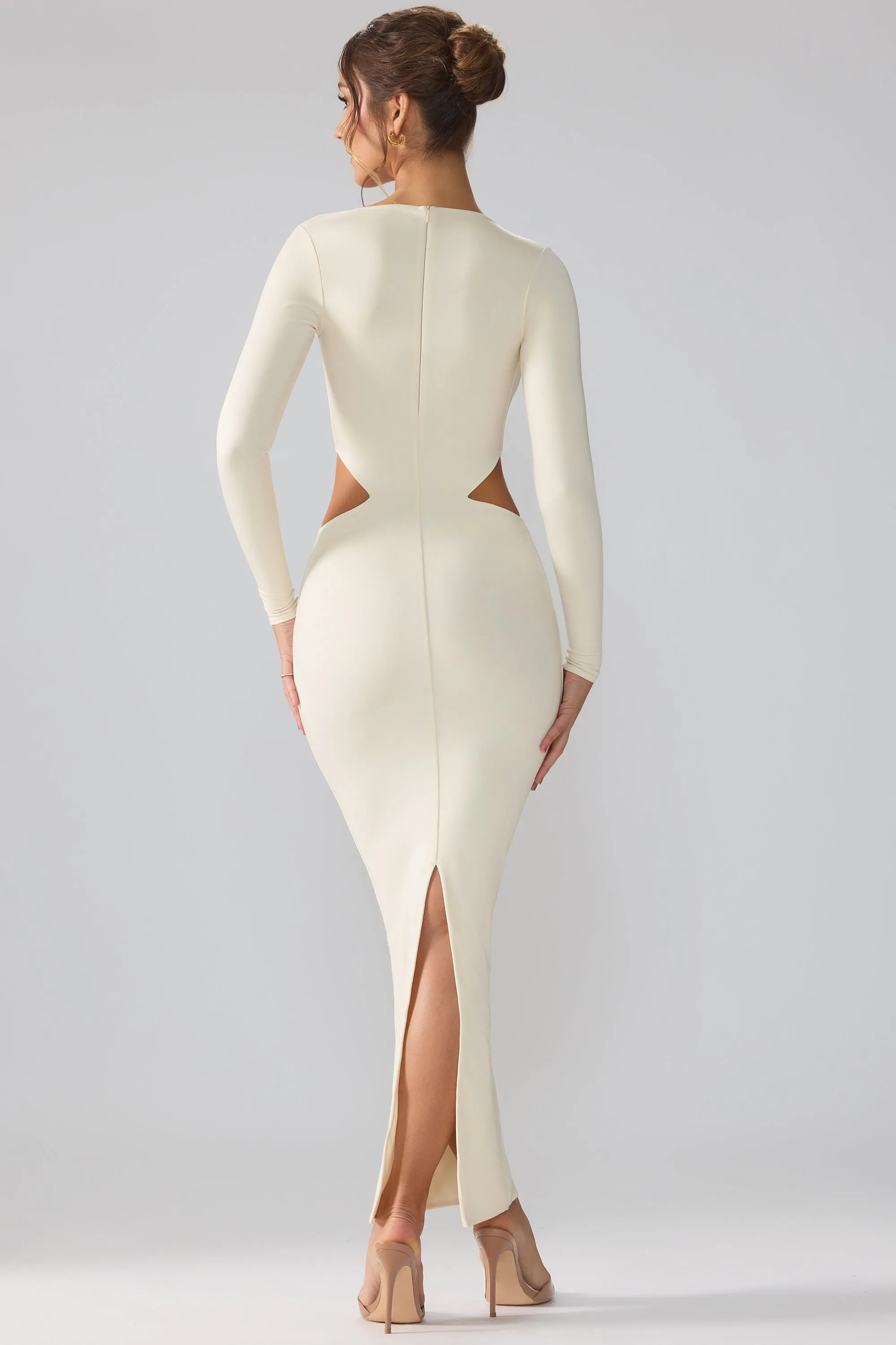 Premium Jersey Long Sleeve Cut Out Maxi Dress in Ivory With its simple and clean design this dress makes a chic statement wherever you go