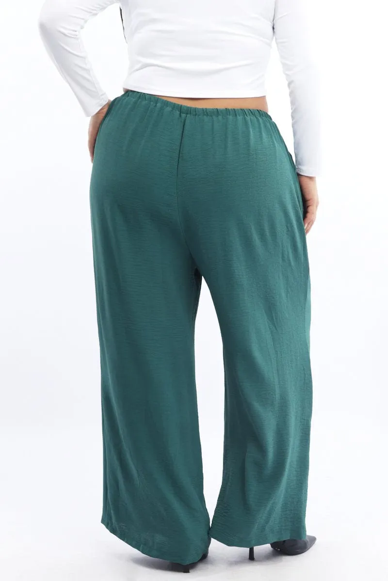 Green Textured Georgette Lined Wide Leg Pants Side slits Reflective accents