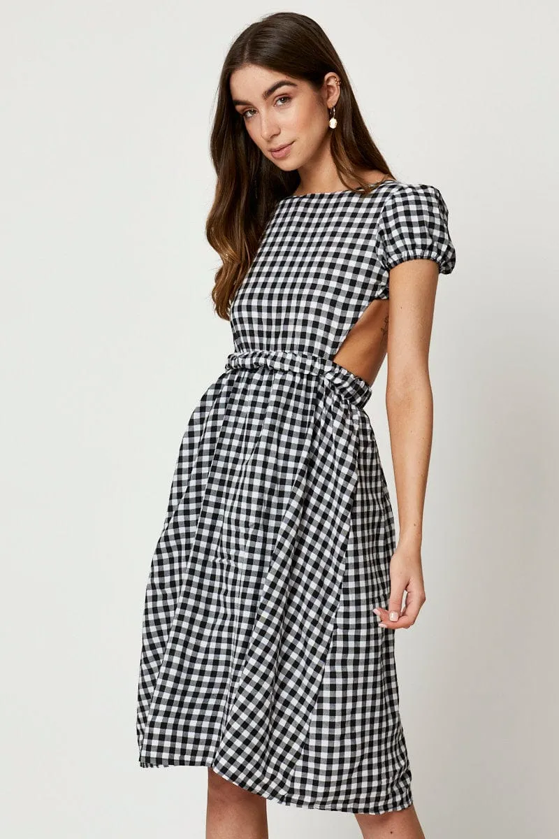 Black Check Cross Back Dress The versatile nature of this maxi dress allows for a range of styling possibilities from casual to chic