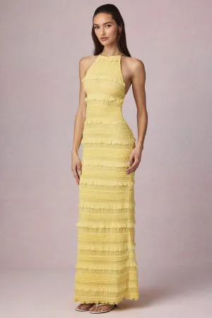 Perfect for layering with jackets or sweaters this maxi dress works for year-round wear breath easy Ruffled Backless Halterneck Maxi Dress in Lemon Yellow