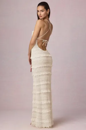 Ruffled Backless Halterneck Maxi Dress in Ivory This dress features a classic design that works well for both day and night wear