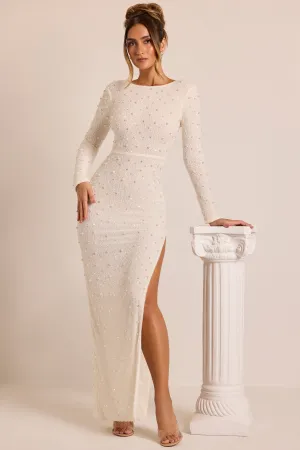 Embellished Long Sleeve Backless Maxi Dress in White Perfect for layering or wearing on its own this dress adapts to any season Star Trail