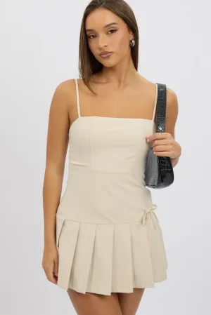 Heroine Glow SplitHemDesign Beige Pleated Mini Dress
