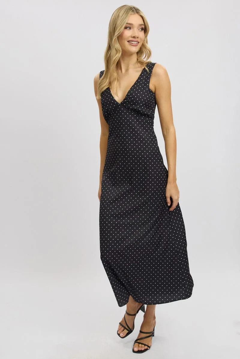 Designed with simplicity and sophistication in mind this dress is perfect for any occasion Palm Shade Black Polka Dot Maxi Dress V-neck