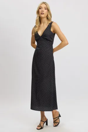 Its versatile length ensures it can be worn for a variety of occasions from casual to formal Black Polka Dot Maxi Dress V-neck