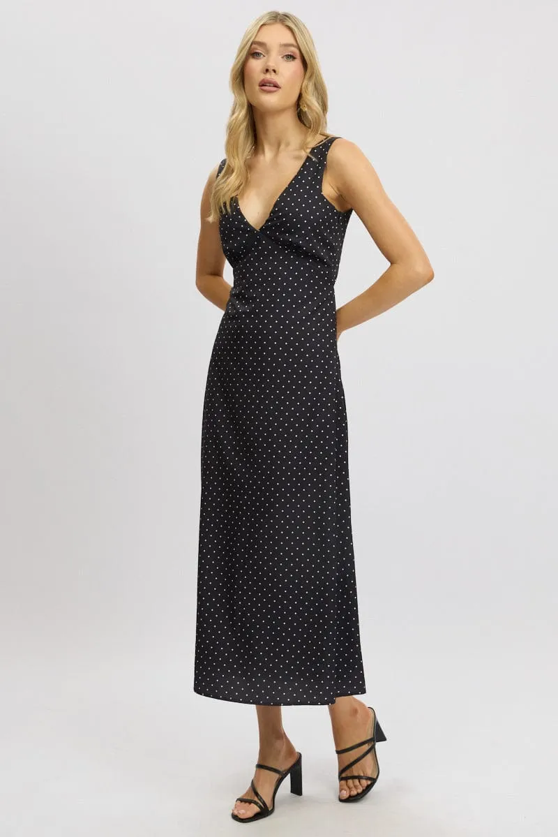Its versatile length ensures it can be worn for a variety of occasions from casual to formal Black Polka Dot Maxi Dress V-neck
