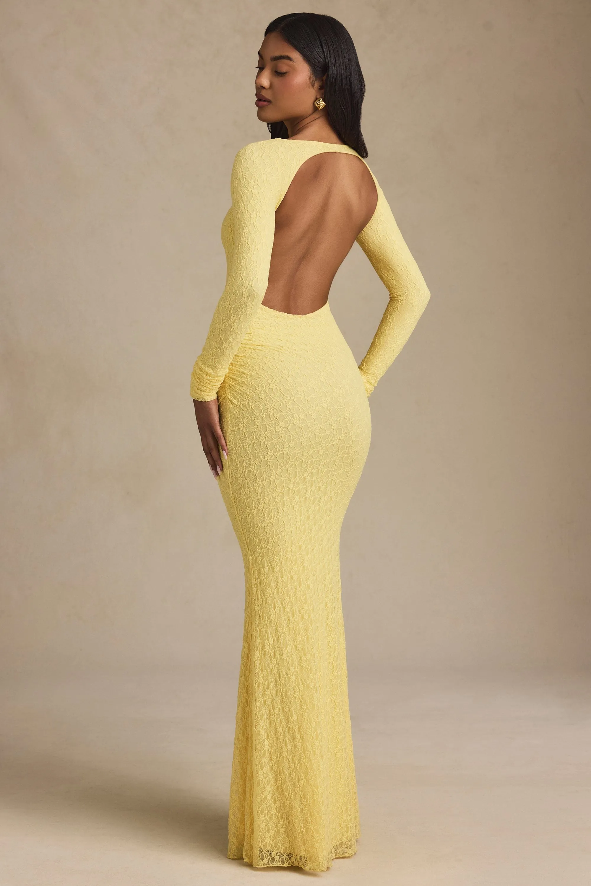 Ruched Backless Lace Maxi Dress in Pastel Yellow This dress provides the ideal balance of style and comfort making it a wardrobe essential