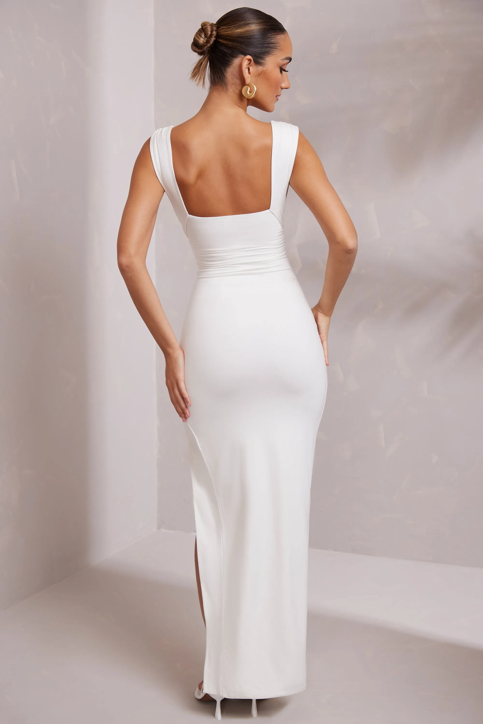 Sun shield With a flowy skirt and a structured top this maxi dress offers a perfect balance of comfort and style High Split Plunge Neck Maxi Dress in White