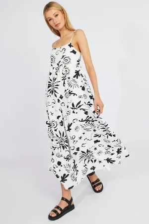 The versatile design of this maxi dress makes it perfect for a variety of occasions White Abstract Maxi Dress Strappy Tiered