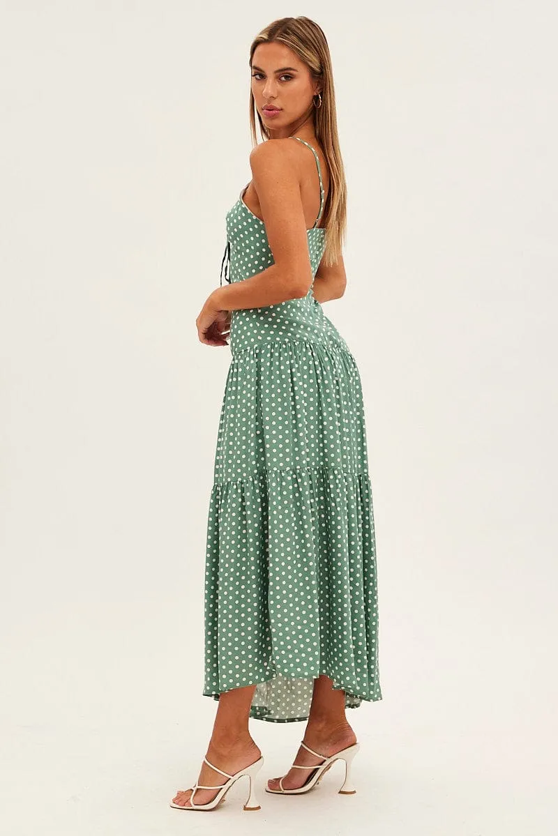 Angel Feel The versatile nature of this maxi dress allows for a range of styling possibilities from casual to chic Print Polka Dot Maxi Dress Sleeveless Tie Front Tiered Polka Dot