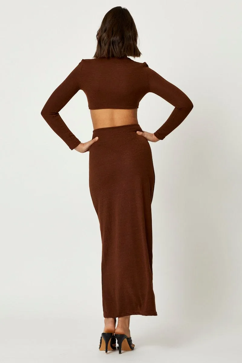 Brown Knot Front Cut Out Dress This dress is the ideal choice for those who want comfort and elegance in one garment This dress provides a chic and comfortable fit that works for both formal and casual events