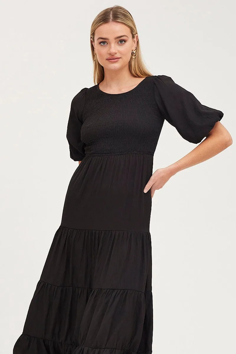 Gorgeous floor-length style Boardwalk Mood Black Shirred Dress Short Sleeve Maxi