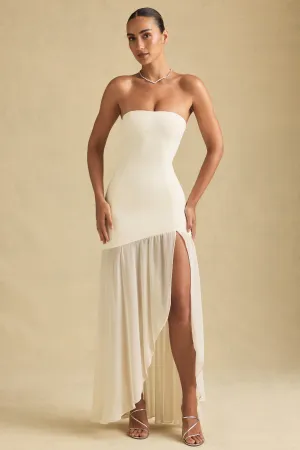 Coral Pop Perfect for layering or wearing on its own this dress adapts to any season Asymmetric Strapless Fishtail Maxi Dress in Ivory