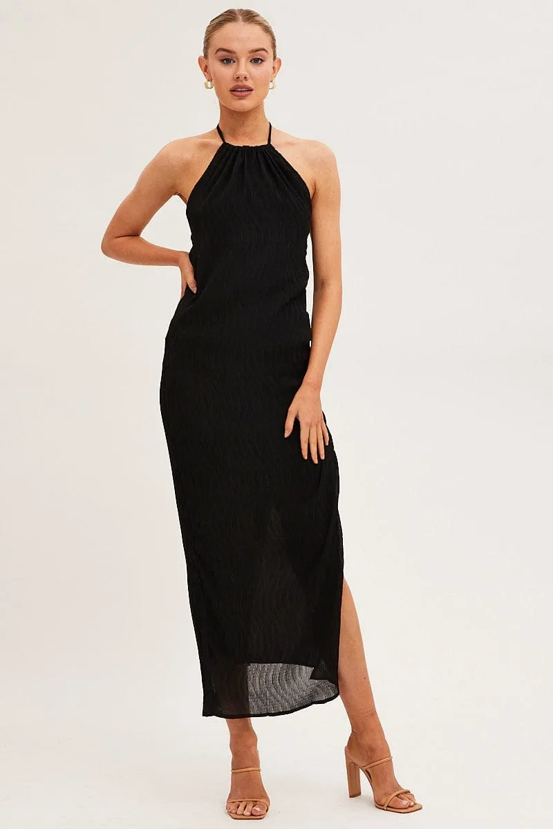 This dress provides a chic and comfortable fit that works for both formal and casual events Ruby Pop Black Textured Halter Dress Backless