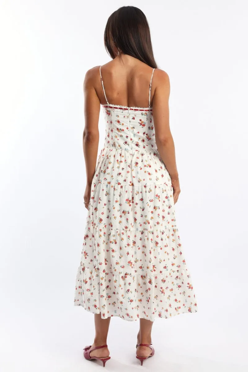 With its timeless design this dress is perfect for any season and any setting White Floral Maxi Dress Satin Tape Detail