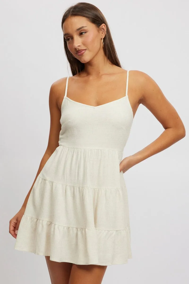 Beige Mini Dress Tiered Strappy Star Glow Chic Look
