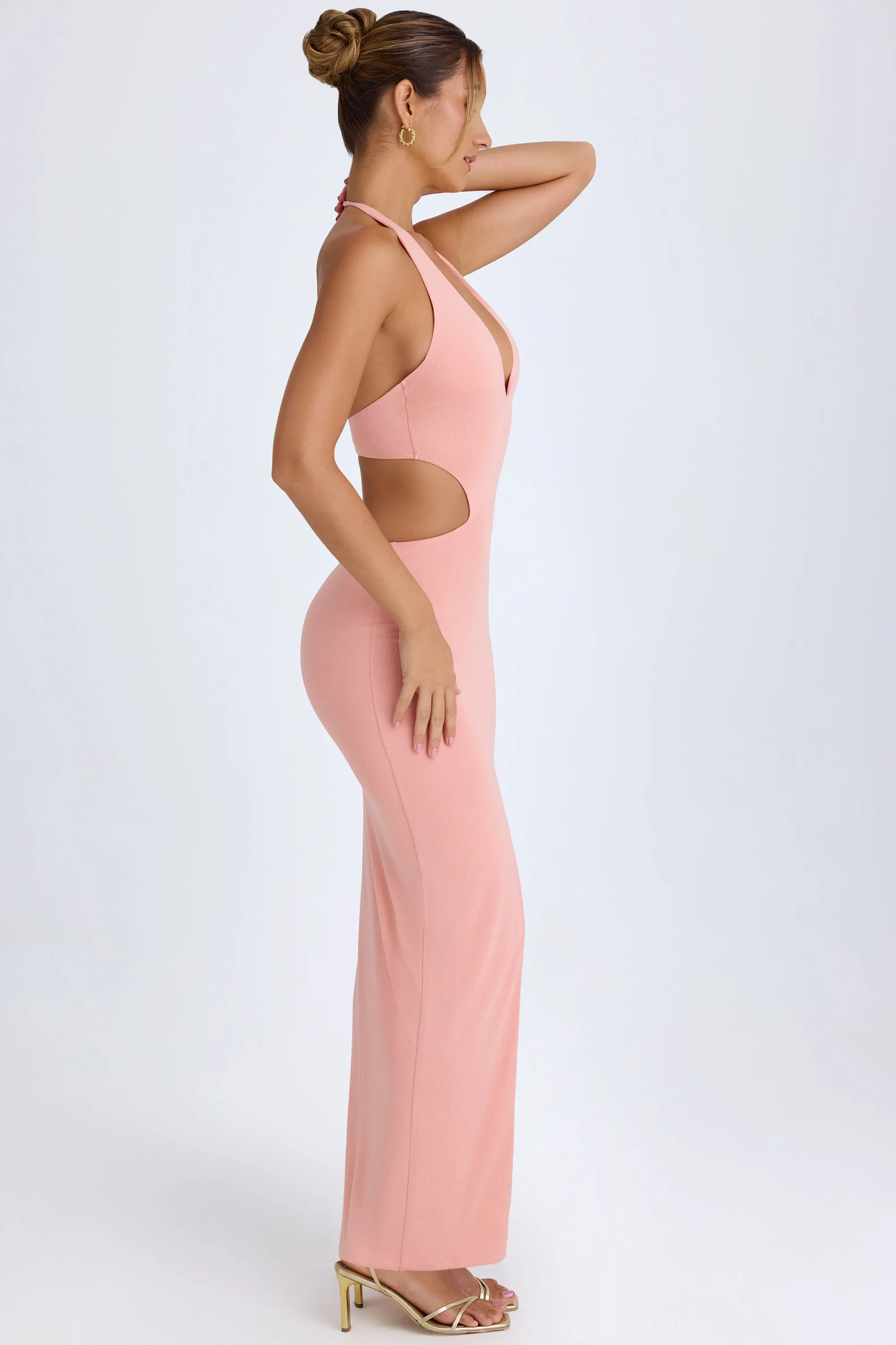 Cut-Out Halterneck Maxi Dress in Apricot Pink Designed with a simple yet elegant cut this dress works for both casual and formal occasions Calm River