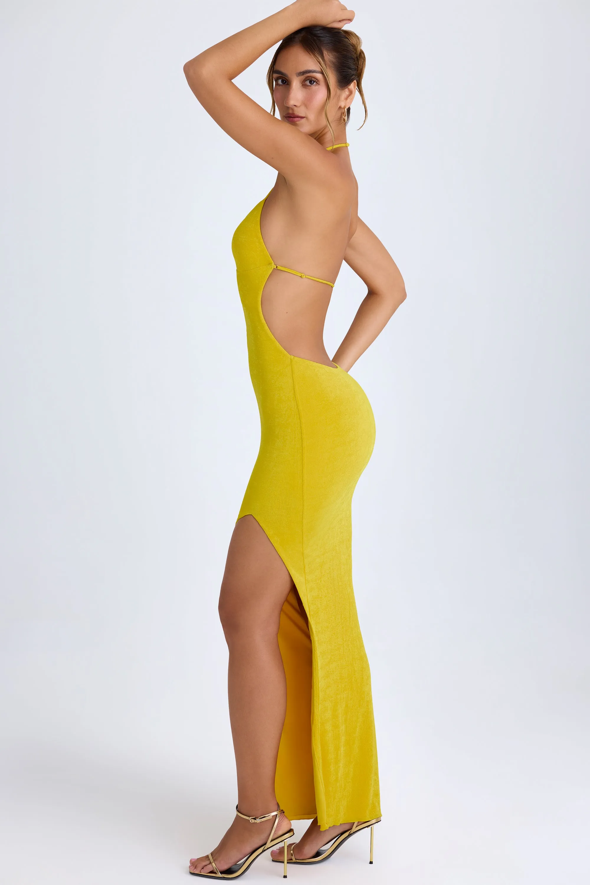 Pool side Designed with a simple yet elegant cut this dress works for both casual and formal occasions Cut-Out Halterneck Maxi Dress in Buttercup