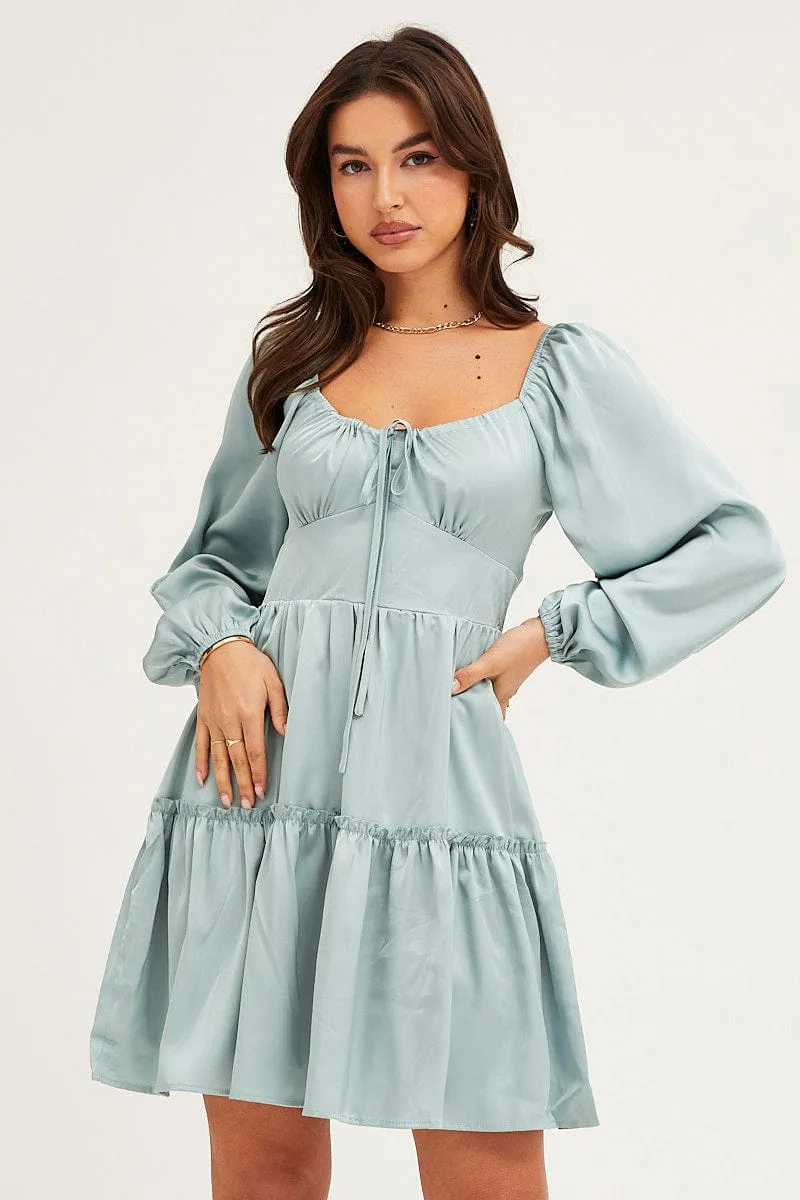 MultiPanelCut WeightlessLayeringPiece Green Ruffle Skater Dress